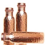 Three Hammered Copper Bottles
