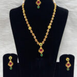 32B Golden and Green Diamond Work Necklace Set with Maang Tika