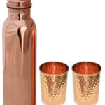 One Plain Copper Bottle And Two Hammered Copper Glasses