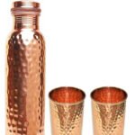 One Lacquire Hammered Copper Bottle And Two Hammered Copper Glass