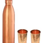 One Plain Copper Bottle And Two Hammered Copper Glasses